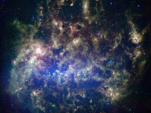 The Large Magellanic Cloud, an irregular galaxy, is visible in the night sky over the Earth's Southern Hemisphere and may contain hidden astronomical wonders yet to be revealed in the images collected by the Large Synoptic Survey Telescope.