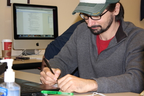 Student veteran Stephen W. Cadette, who served in the Air Force for four years, works on homework at the UA's Student VETS Center.