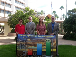 The Economic Impact Analysis Team, from left: Dari Duval, George Frisvold and Ashley Kerna, with College of Agriculture and Life Sciences Dean Shane Burgess (Photo: Faith Schwartz/UA Cooperative Extension) The Economic Impact Analysis Team, from left: Dari Duval, George Frisvold and Ashley Kerna, with College of Agriculture and Life Sciences Dean Shane Burgess (Photo: Faith Schwartz/UA Cooperative Extension)