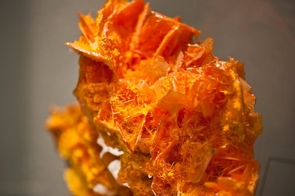 Wulfenite and mimetite from Tiger mine in Arizona are among the minerals in the UA Mineral Museum collection. On Feb. 3, the museum will open a one-year exhibition of the gems and minerals that helped solidify Arizona's statehood. (Photo credit: Patrick McArdle/UANews) Wulfenite and mimetite from Tiger mine in Arizona are among the minerals in the UA Mineral Museum collection. On Feb. 3, the museum will open a one-year exhibition of the gems and minerals that helped solidify Arizona's statehood. (Photo credit: Patrick McArdle/UANews)