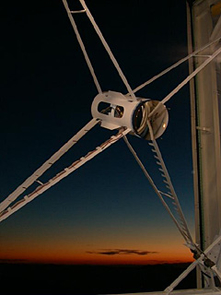 The adaptive secondary mirror at the 6.5-meter MMTO telescope sits like a jewel in the night sky, as astronomers prepare for another night of "AO'ing" (Photo: Francois Wildi) The adaptive secondary mirror at the 6.5-meter MMTO telescope sits like a jewel in the night sky, as astronomers prepare for another night of "AO'ing" (Photo: Francois Wildi)