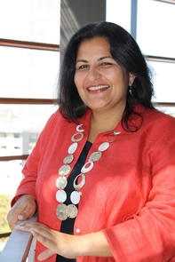 UA faculty member Anita Bhappu has been investigating digital coupon usage, involving prior and current graduate students. Project collaborators included Jennifer Andrews, Charles Lawry and Zeinou Toure – all in retailing and consumer sciences. She also has involved undergraduates in the investigations. (Photo credit: Beatriz Verdugo/UANews) UA faculty member Anita Bhappu has been investigating digital coupon usage, involving prior and current graduate students. Project collaborators included Jennifer Andrews, Charles Lawry and Zeinou Toure – all in retailing and consumer sciences. She also has involved undergraduates in the investigations. (Photo credit: Beatriz Verdugo/UANews)