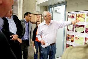 Regents' Professor of Astronomy and Optical Sciences Roger Angel leads the delegation from Mexico on a tour of the UA's Steward Observatory Mirror Lab. (Photo: Hannah Bergeron/UANews) Regents' Professor of Astronomy and Optical Sciences Roger Angel leads the delegation from Mexico on a tour of the UA's Steward Observatory Mirror Lab. (Photo: Hannah Bergeron/UANews)