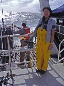 Li Deng, co-first author on the Nature paper, stands on the deck of the research vessel "Western Flyer" in front of the sampling device used to measure salinity, temperature and depth of the ocean during sample collection. (Photo: Sullivan lab) Li Deng, co-first author on the Nature paper, stands on the deck of the research vessel "Western Flyer" in front of the sampling device used to measure salinity, temperature and depth of the ocean during sample collection. (Photo: Sullivan lab)