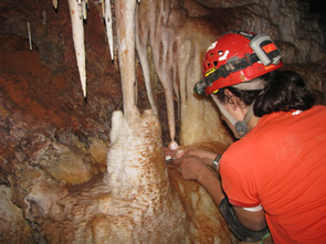 (Click to enlarge) Sarah Truebe, a geosciences doctoral student at the
University of Arizona, checks on an experiment that measures how fast cave formations grow in Arizona's Cave of the Bells. (Copyright 2010 Stella Cousins) (Click to enlarge) Sarah Truebe, a geosciences doctoral student at the
University of Arizona, checks on an experiment that measures how fast cave formations grow in Arizona's Cave of the Bells. (Copyright 2010 Stella Cousins)