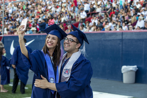 Amanda Ochs, an architecture graduate from Cave Creek, Arizona, and Stefano Saltalamacchia, a cultural understanding major from Ontario, California, pose for a selfie at Commencement. (Photo: John de Dios/UANews) Amanda Ochs, an architecture graduate from Cave Creek, Arizona, and Stefano Saltalamacchia, a cultural understanding major from Ontario, California, pose for a selfie at Commencement. (Photo: John de Dios/UANews)