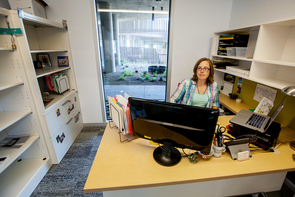 Angie Brown, the Institute of the Environment's projects and events coordinator, gets acclimated to her new space. Brown also is a member of the Art & Environment Network, an on- and off-campus group of individuals working to create more cohesion between the arts and environmental sciences. (Photo: John de Dios/UANews) Angie Brown, the Institute of the Environment's projects and events coordinator, gets acclimated to her new space. Brown also is a member of the Art & Environment Network, an on- and off-campus group of individuals working to create more cohesion between the arts and environmental sciences. (Photo: John de Dios/UANews)