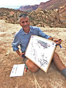 Paleofluids collaborator and structural geologist Bob Krantz reviews Paradox Basin tectonic history overlooking the Moab Fault. (Photo: Peter Reiners) Paleofluids collaborator and structural geologist Bob Krantz reviews Paradox Basin tectonic history overlooking the Moab Fault. (Photo: Peter Reiners)