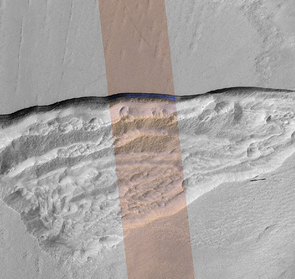 A cross section of underground ice is exposed at the steep slope that appears bright blue in this enhanced-color view from the HiRISE camera on NASA's Mars Reconnaissance Orbiter. The scene is about 550 yards wide. The scarp drops about 140 yards from the level ground in the upper third of the image. (Image: NASA/JPL-Caltech/UA/USGS) A cross section of underground ice is exposed at the steep slope that appears bright blue in this enhanced-color view from the HiRISE camera on NASA's Mars Reconnaissance Orbiter. The scene is about 550 yards wide. The scarp drops about 140 yards from the level ground in the upper third of the image. (Image: NASA/JPL-Caltech/UA/USGS)