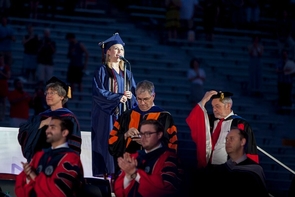 Sarah Julia Ambrose, a Bachelor of Fine Arts graduate, led the stadium in the singing of the national anthem. Sarah Julia Ambrose, a Bachelor of Fine Arts graduate, led the stadium in the singing of the national anthem.