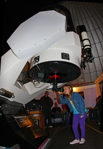 A young visitor peers through the Schulman Telescope during a SkyNights public observing event. (Photo: Adam Block) A young visitor peers through the Schulman Telescope during a SkyNights public observing event. (Photo: Adam Block)