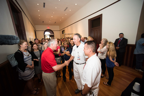 Dr. Robert C. Robbins greets faculty and staff inside Old Main. (Photo: Jacob Chinn) Dr. Robert C. Robbins greets faculty and staff inside Old Main. (Photo: Jacob Chinn)