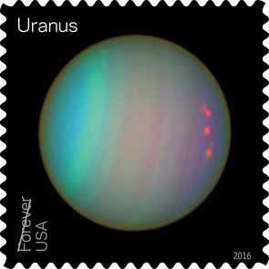 In 2003, Hubble’s Advanced Camera for Surveys obtained the false color image of Uranus shown on the stamp pane. It reveals faint bands, similar to but fainter than those found on Jupiter and Saturn. Colors in the bands give scientists a method of measuring the altitudes of the planet’s clouds. The true color of Uranus has been described as a dull blue or as blue-green. (Image: NASA/ESA/Erich Karkoschka)
In 2003, Hubble’s Advanced Camera for Surveys obtained the false color image of Uranus shown on the stamp pane. It reveals faint bands, similar to but fainter than those found on Jupiter and Saturn. Colors in the bands give scientists a method of measuring the altitudes of the planet’s clouds. The true color of Uranus has been described as a dull blue or as blue-green. (Image: NASA/ESA/Erich Karkoschka)