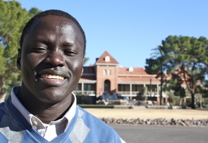 In making the "smart" decision to send him away, Wol Akujang said his parents decided his brother could "run if he had to" and his younger sister could be carried. But he would not be able to protect himself if Pap, his isolated village, were attacked. He was sent away by foot and, years later, relocated to the U.S. Now, he has graduated from the UA and is preparing for a trip to return to South Sudan. In making the "smart" decision to send him away, Wol Akujang said his parents decided his brother could "run if he had to" and his younger sister could be carried. But he would not be able to protect himself if Pap, his isolated village, were attacked. He was sent away by foot and, years later, relocated to the U.S. Now, he has graduated from the UA and is preparing for a trip to return to South Sudan.