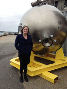 Bonnie Hurwitz next to the metal pod that serves as the main chamber for the Alvin submersible that scientists operate to collect samples from the deepest parts of the ocean not accessible to people. Photo taken at Woods Hole Oceanographic Institution. (Photo: Stefan Sievert) Bonnie Hurwitz next to the metal pod that serves as the main chamber for the Alvin submersible that scientists operate to collect samples from the deepest parts of the ocean not accessible to people. Photo taken at Woods Hole Oceanographic Institution. (Photo: Stefan Sievert)