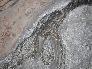 A kite-based image of sinuous channels within the December 1974 flow. These channels resemble those carved by water, but were formed by the flow of lava. Analogous channels occur on Mars. (Image: Stephen Scheidt) A kite-based image of sinuous channels within the December 1974 flow. These channels resemble those carved by water, but were formed by the flow of lava. Analogous channels occur on Mars. (Image: Stephen Scheidt)