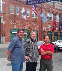 The UA’s Ricardo Valerdi (right) recently traveled to Fenway Park and met with (from left) Andy Andres, a Boston University professor and the MIT Science of Baseball program founder; Bill James, the legendary Red Sox pioneer of sabermetrics, the premise behind the 2011 movie “Moneyball”; and Tim Zue (not shown), vice president of Fenway Sports Management and director of business development for the Boston Red Sox.