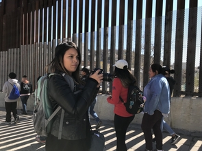 Carmen Valencia, a former journalism undergraduate student, gets ready to take a photograph during a tour of Ambos Nogales. (Photo courtesy of Celeste González de Bustamante) Carmen Valencia, a former journalism undergraduate student, gets ready to take a photograph during a tour of Ambos Nogales. (Photo courtesy of Celeste González de Bustamante)