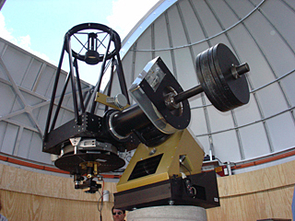 The 20-inch John Jamieson Telescope is equipped with a state-of-the-art 256 x 256 mercury-cadmium-tellurium infrared detector array. That's the same kind of infrared detector array that UA scientists developed for the infrared camera flying on the Hubble Space Telescope. Infrared light has longer wavelengths than visible light. It is the light emitted by objects far away and far back in time, near the beginning of the universe. (Photo: Lori Stiles) The 20-inch John Jamieson Telescope is equipped with a state-of-the-art 256 x 256 mercury-cadmium-tellurium infrared detector array. That's the same kind of infrared detector array that UA scientists developed for the infrared camera flying on the Hubble Space Telescope. Infrared light has longer wavelengths than visible light. It is the light emitted by objects far away and far back in time, near the beginning of the universe. (Photo: Lori Stiles)