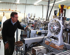 Greg Hodgins checks on the accelerator mass spectrometer, which narrowed the age of the book down to 1404 to 1438, in the early Renaissance. (Photo by Daniel Stolte/UANews) Greg Hodgins checks on the accelerator mass spectrometer, which narrowed the age of the book down to 1404 to 1438, in the early Renaissance. (Photo by Daniel Stolte/UANews)
