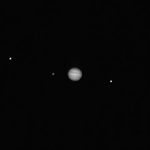 The PolyCam imager on-board OSIRIS-REx captured this image of Jupiter (center) and three of its moons, Callisto (left), Io, and Ganymede. The image was taken on Feb. 12, when the spacecraft was 76 million miles (122 million kilometers) from Earth and 418 million miles (673 million kilometers) from Jupiter. (Image: NASA/Goddard/University of Arizona) The PolyCam imager on-board OSIRIS-REx captured this image of Jupiter (center) and three of its moons, Callisto (left), Io, and Ganymede. The image was taken on Feb. 12, when the spacecraft was 76 million miles (122 million kilometers) from Earth and 418 million miles (673 million kilometers) from Jupiter. (Image: NASA/Goddard/University of Arizona)