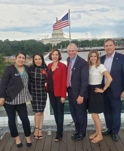 The UA was represented at the "Seal of Excelencia" announcement by (from left): Veronica Castro, executive associate in the Executive Office of the President; Marla A. Franco, assistant vice provost for Hispanic Serving Institution Initiatives; Andrea Romero, vice provost for faculty affairs; UA President Robert C. Robbins; Julia Smith, assistant vice president for federal relations; and John Mester, associate vice president for research. The UA was represented at the "Seal of Excelencia" announcement by (from left): Veronica Castro, executive associate in the Executive Office of the President; Marla A. Franco, assistant vice provost for Hispanic Serving Institution Initiatives; Andrea Romero, vice provost for faculty affairs; UA President Robert C. Robbins; Julia Smith, assistant vice president for federal relations; and John Mester, associate vice president for research.