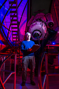 John Cocke next to the 21-inch telescope at Steward Observatory on the UA campus. (Photo courtesy of Nathaniel Johnston/njohnstonphotography.com) John Cocke next to the 21-inch telescope at Steward Observatory on the UA campus. (Photo courtesy of Nathaniel Johnston/njohnstonphotography.com)