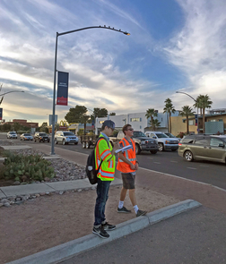 Xiaofeng Li, a graduate research assistant in Wu's lab, and Alex Weber, who earned his Masters of Engineering from UArizona in 2018, conduct research on Speedway Boulevard. Xiaofeng Li, a graduate research assistant in Wu's lab, and Alex Weber, who earned his Masters of Engineering from UArizona in 2018, conduct research on Speedway Boulevard.