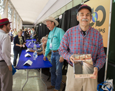 Author Bob "Boze" Bell (background) and Russ Luke at the Integrated Learning Center author signing area. While seeking Bell’s autograph, Luke discovered they had grown up in the same town of Kingman, Arizona. Author Bob "Boze" Bell (background) and Russ Luke at the Integrated Learning Center author signing area. While seeking Bell’s autograph, Luke discovered they had grown up in the same town of Kingman, Arizona.