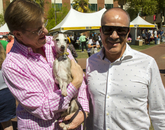 Keith Hoshal and Hector Gomez of Los Angeles show Bo around the festival. Keith Hoshal and Hector Gomez of Los Angeles show Bo around the festival.