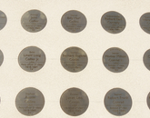 A close-up of the medallions. Comparing the finished memorial with its earlier design, Tucsonan Bill Westcott said the project "got bigger and more important in an emotional way."