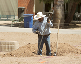 Sergio Gonzales digs as part of the USS Arizona Mall Memorial's construction. Sergio Gonzales digs as part of the USS Arizona Mall Memorial's construction.
