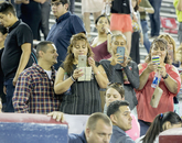 Guests capture the moment from the stands. Guests capture the moment from the stands.