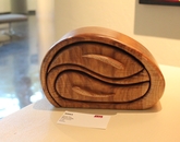 "Whale Play" by Marvin Landis, a UA retiree. A wooden craft piece.