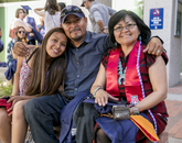 Molly Dayzie, who received a master's degree in clinical systems leadership from the College of Nursing, with her daughter, Daryline, and husband, Jimmie. Molly Dayzie, who received a master's degree in clinical systems leadership from the College of Nursing, with her daughter, Daryline, and husband, Jimmie.