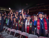 A group of Native American students celebrate their graduation from the UA. (Photo: John de Dios/UANews) A group of Native American students celebrate their graduation from the UA. (Photo: John de Dios/UANews)