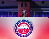 UA President Robert C. Robbins keeps the 90-minute program moving from the Commencement stage. (Photo: John de Dios/UANews) UA President Robert C. Robbins keeps the 90-minute program moving from the Commencement stage. (Photo: John de Dios/UANews)