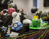 Two entries in the Office of the Provost's pumpkin-crafting contest were elaborately decorated to resemble a Smurf and a frog prince. (Photo: Kyle Mittan/University Communications) Pumpkins decorated to look like a Smurf and a frog prince, presented on a table.
