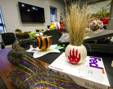 One entry was crafted to resemble the Wilson volleyball from the film "Cast Away," while another looked like a bumblebee. (Photo: Kyle Mittan/University Communications) A pumpkin decorated to look like the Wilson volleyball from the film "Cast Away" and a pumpkin decorated like a bumblebee.