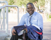 Bakina Wellars, who earned a master's degree in journalism, is returning to his home country of Rwanda in Africa to resume his career as a faculty member at the Catholic Institute of Kabgayi. “I wanted to take something that I could put in my office that people would be able to see and recognize, so the most important thing I am taking home with me is the UA flag." Bakina Wellars, who earned a master's degree in journalism, is returning to his home country of Rwanda in Africa to resume his career as a faculty member at the Catholic Institute of Kabgayi. “I wanted to take something that I could put in my office that people would be able to see and recognize, so the most important thing I am taking home with me is the UA flag."
