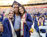Savannah Stehman, graduating with a degree in marketing, poses with friends Lanre Akomolafe, a computer science graduate, and Amanda Emergy, a marketing graduate. Stehman will move to Phoenix to work for the Phoenix Suns. Akomolafe will move to Seattle to work for Microsoft. (Photo: John de Dios/UANews) Savannah Stehman, graduating with a degree in marketing, poses with friends Lanre Akomolafe, a computer science graduate, and Amanda Emergy, a marketing graduate. Stehman will move to Phoenix to work for the Phoenix Suns. Akomolafe will move to Seattle to work for Microsoft. (Photo: John de Dios/UANews)