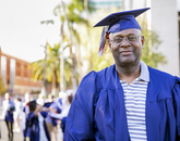 Former UA basketball player Larry Demic, a graduate in general studies, has been in the corporate world for 30 years and currently works for Konica Minolta in Los Angeles. He completed his degree online. (Photo: John de Dios/UANews) Former UA basketball player Larry Demic, a graduate in general studies, has been in the corporate world for 30 years and currently works for Konica Minolta in Los Angeles. He completed his degree online. (Photo: John de Dios/UANews)