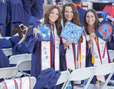 Arts, media and entertainment major Annie Polachek was with Rachel Altfeld and Jessica Granick, both family studies and human development graduates, as they brandished their decorated mortarboards. Arts, media and entertainment major Annie Polachek was with Rachel Altfeld and Jessica Granick, both family studies and human development graduates, as they brandished their decorated mortarboards.