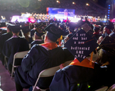A decorated mortarboard carried a keen message. A decorated mortarboard carried a keen message.
