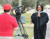 Kendal Washington White, dean of students and vice provost for campus life, poses with the university's ceremonial mace during filming for the virtual 2020 Commencement. (Photo: Chris Richards/University of Arizona) Kendal Washington White, dean of students and vice provost for campus life, poses with the university's ceremonial mace during filming for the virtual 2020 Commencement. (Photo: Chris Richards/University of Arizona)