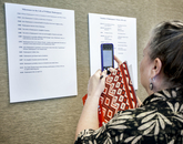 Nicki Navarro, an English teacher from Sahuarita High School, photographs a chronology of milestones in William Shakespeare's life. The timeline is part of the Shakespeare and Elizebathan Culture exhibit at UA Library Special Collections that will be on display until July. Nicki Navarro, an English teacher from Sahuarita High School, photographs a chronology of milestones in William Shakespeare's life. The timeline is part of the Shakespeare and Elizebathan Culture exhibit at UA Library Special Collections that will be on display until July.