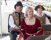 Jane Prescott-Smith, special assistant to the dean with University Libraries and one of those who helped get the First Folio to the UA, sits with members of the Renaissance Festival, who later led workshops on improv comedy, sing-along songs and Shakespeare trivia. Jane Prescott-Smith, special assistant to the dean with University Libraries and one of those who helped get the First Folio to the UA, sits with members of the Renaissance Festival, who later led workshops on improv comedy, sing-along songs and Shakespeare trivia.