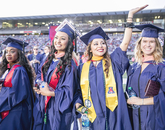 Graduates search for and wave to guests during the pre-show event. Graduates search for and wave to guests during the pre-show event.
