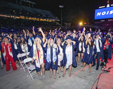 The screen calls for noise, and this merry group of graduates supplies some added volume at Commencement. (Photo: John de Dios/UANews) The screen calls for noise, and this merry group of graduates supplies some added volume at Commencement. (Photo: John de Dios/UANews)