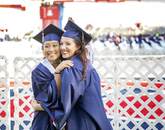 Rachelle Pilapil, a graduate in criminal justice, and Rachel Zaner, a dance major, embrace at Commencement. (Photo: John de Dios/UANews) Rachelle Pilapil, a graduate in criminal justice, and Rachel Zaner, a dance major, embrace at Commencement. (Photo: John de Dios/UANews)